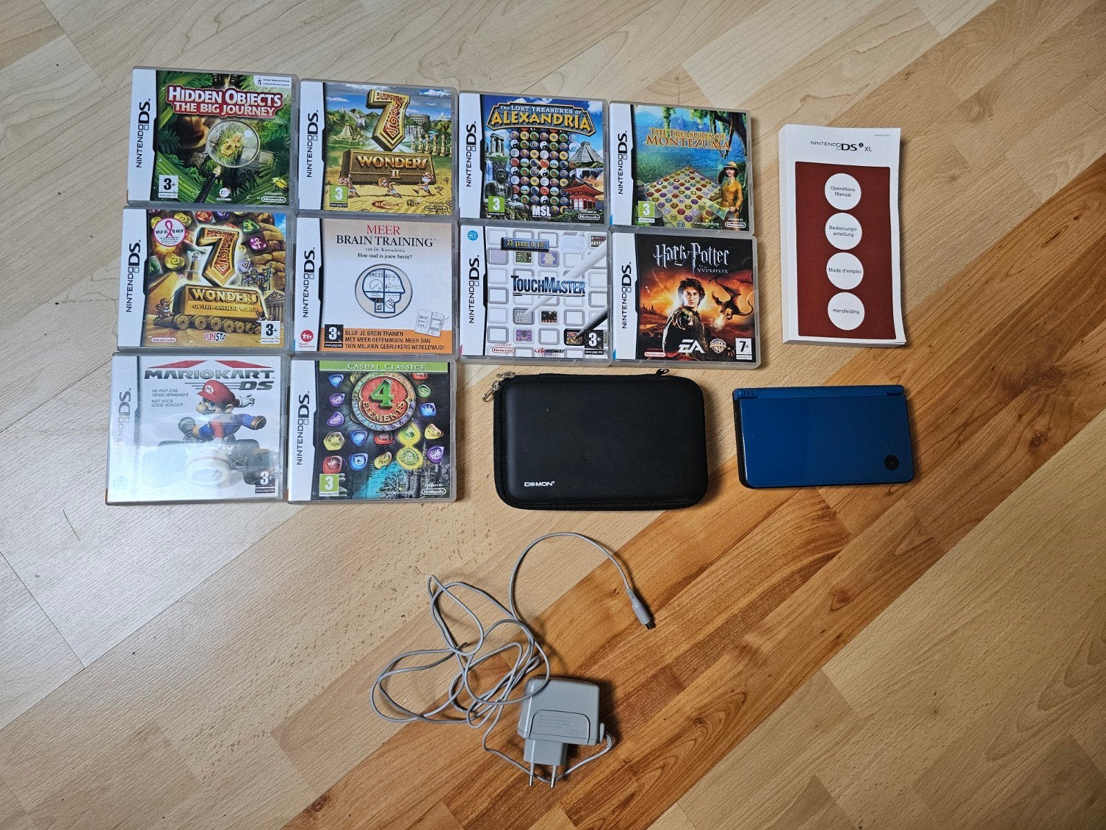 Nintendo DSi XL Blauw met 9 games en hoes, Spelcomputers en Games, Spelcomputers | Nintendo DS, Blauw, Dsi, Ophalen of Verzenden