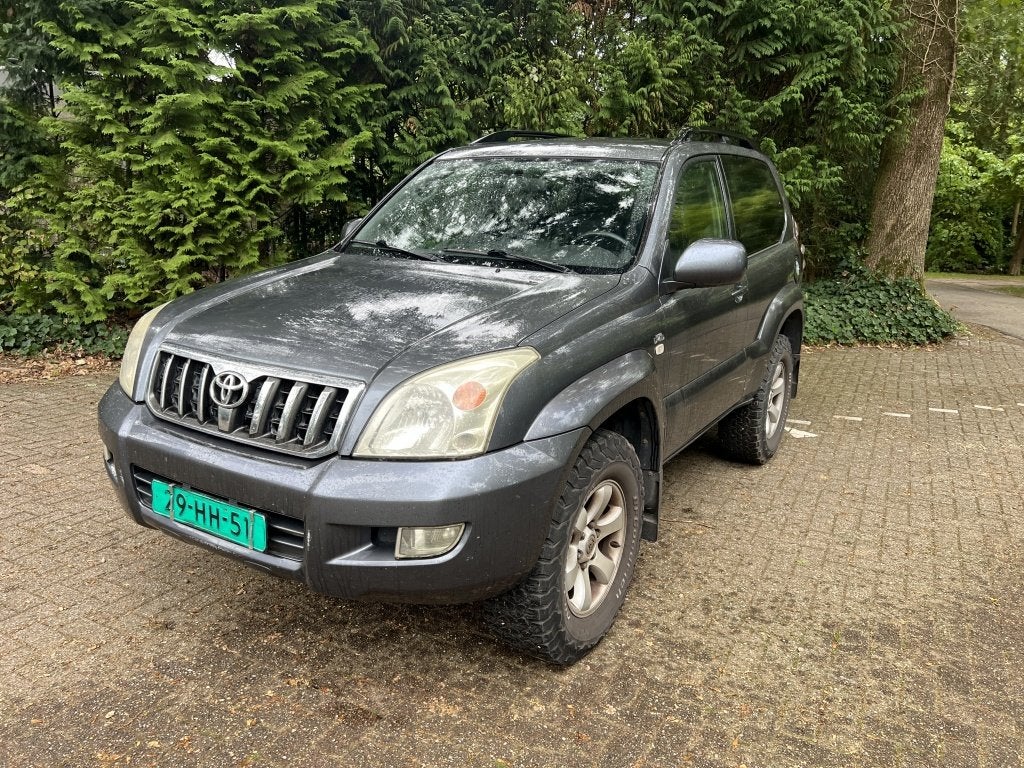 Toyota Land Cruiser 3.0 D-4D VX Gereserveerd (bj 2005), Auto's, Automaat, Gebruikt, Zwart, 4 cilinders