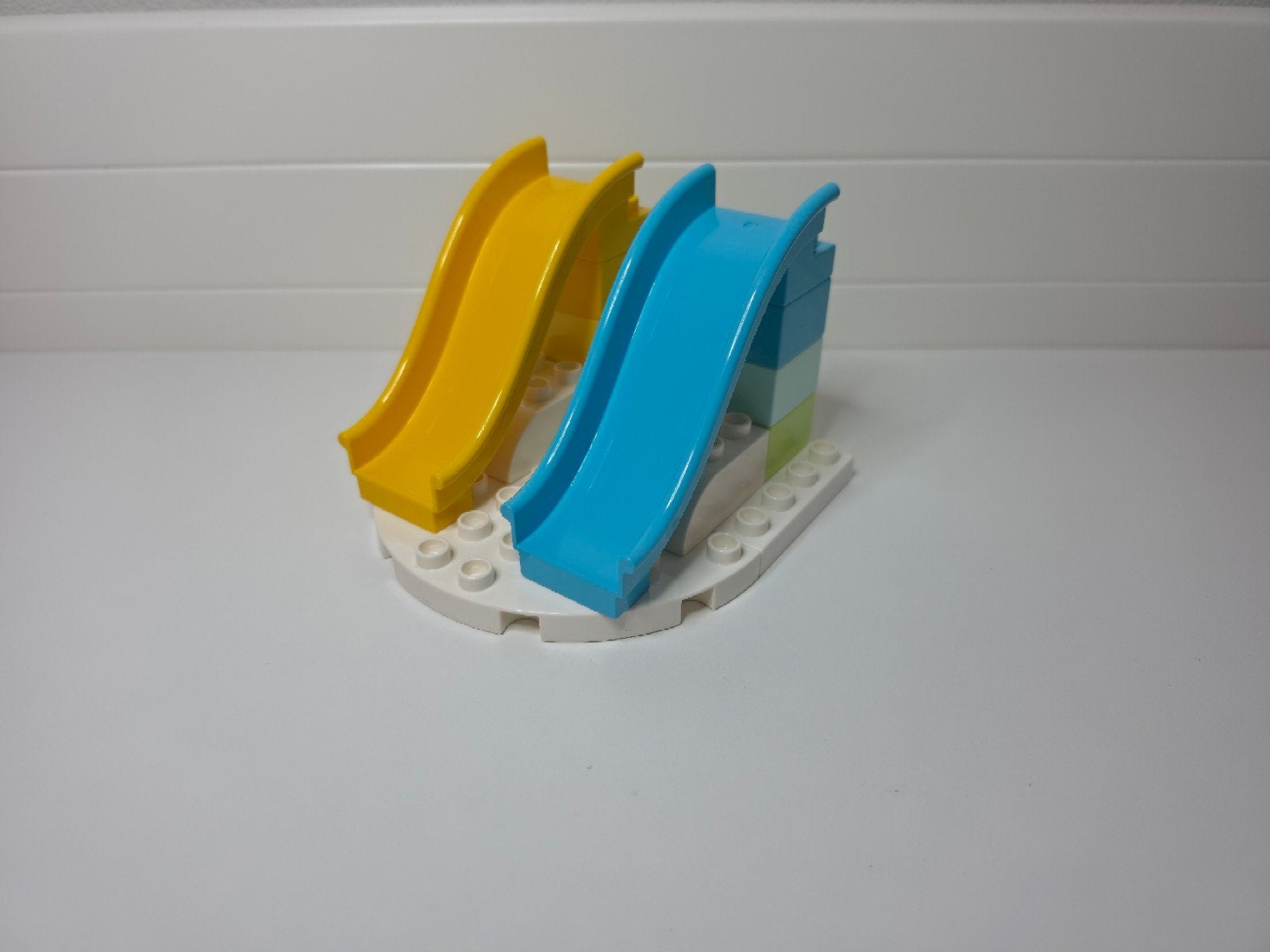 LEGO Duplo 2 kleine glijbanen uit kermis set 10956, Kinderen en Baby's, Speelgoed | Duplo en Lego, Ophalen of Verzenden, Zo goed als nieuw
