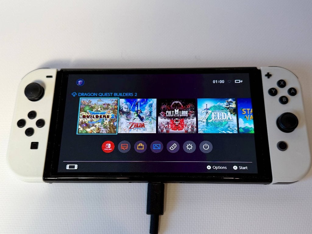 Nintendo Switch OLED in nette staat, Spelcomputers en Games, Zo goed als nieuw, Met harde schijf, Met 1 controller, Switch OLED