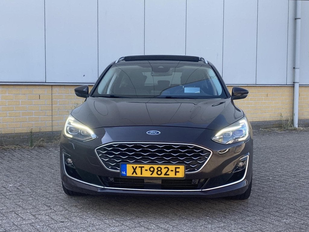 Ford Focus 1.0 EcoBoost 125 pk Vignale Wagon Panoramadak - D, Auto's, Ford, 125 pk, Gebruikt, Bruin, 1283 kg