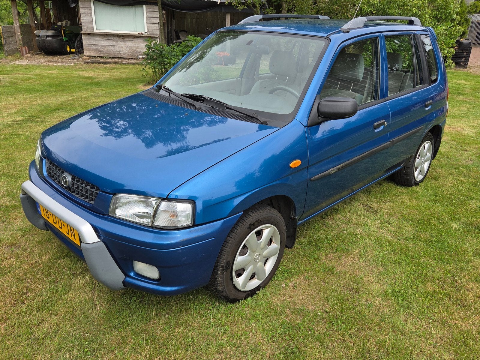 Mazda Demio 1.3 Comfort 1999 Blauw, Auto's, Mazda, Voorwielaandrijving, 410 kg, 31 €/maand, Blauw