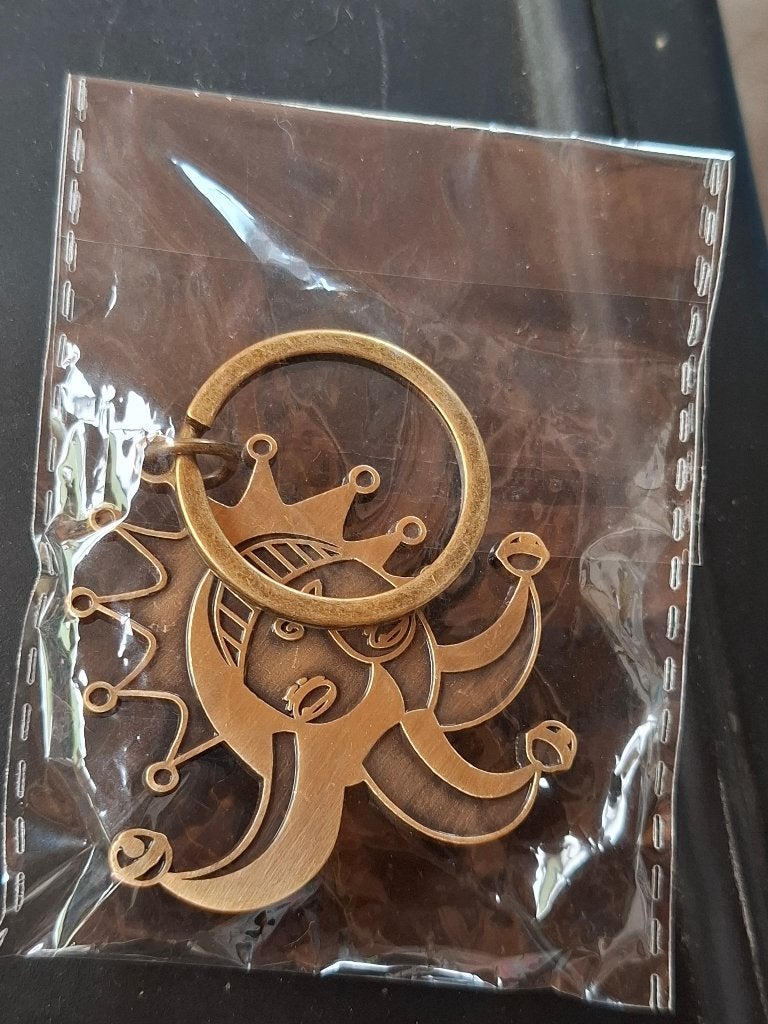 Sleutelhanger + flesopener Brugse Zot, Verzamelen, Ophalen of Verzenden, Nieuw, Flesopener, Overige merken