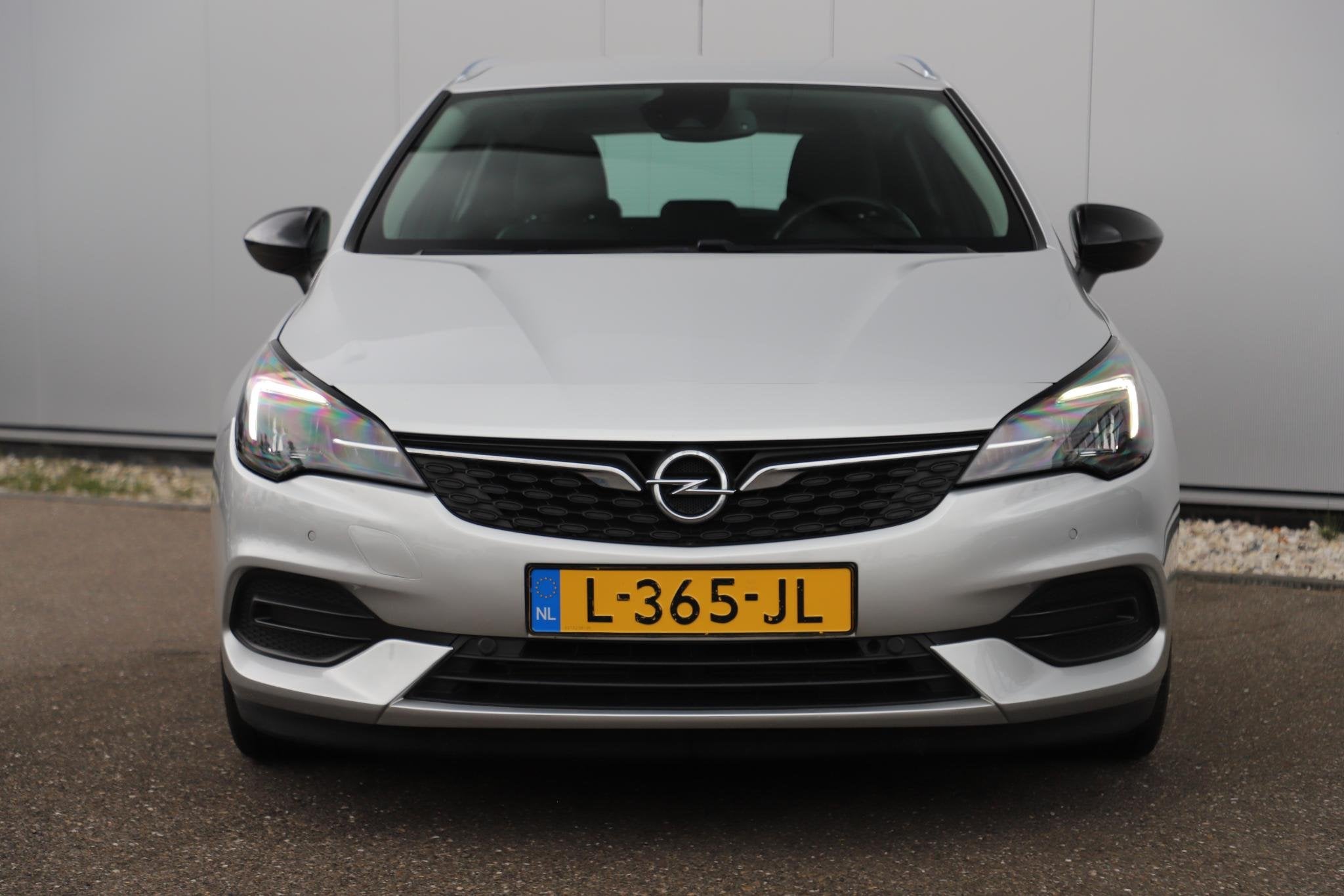 Opel Astra Sports Tourer 1.2 Business Elegance 131PK 16 inch, Auto's, Stof, 1199 cc, Met garantie (alle), Origineel Nederlands
