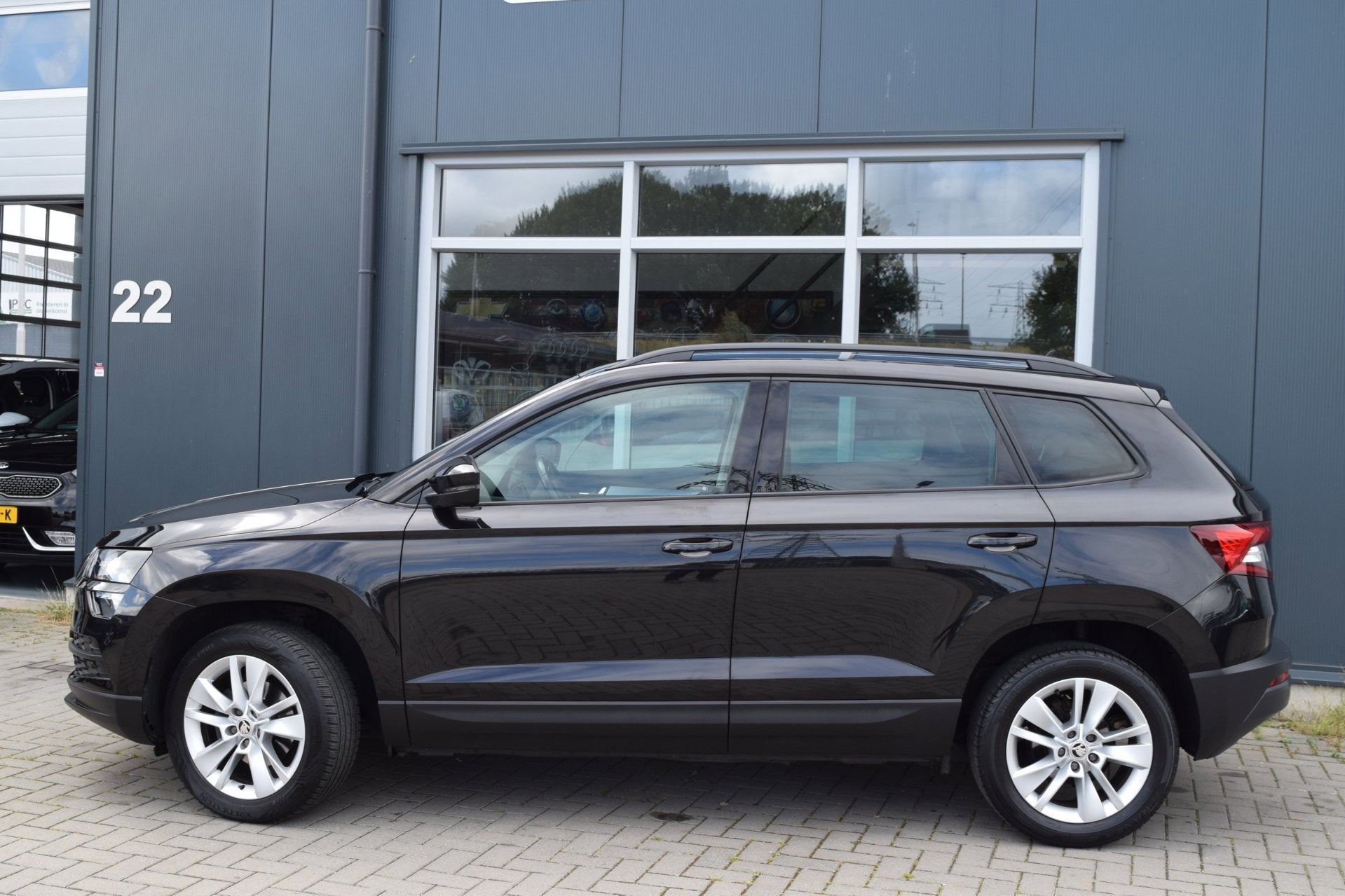 Skoda Karoq 1.0 TSI Ambition Business | Automaat | Clima | N, Automatische klimaatregeling, Stof, Gebruikt, 1261 kg