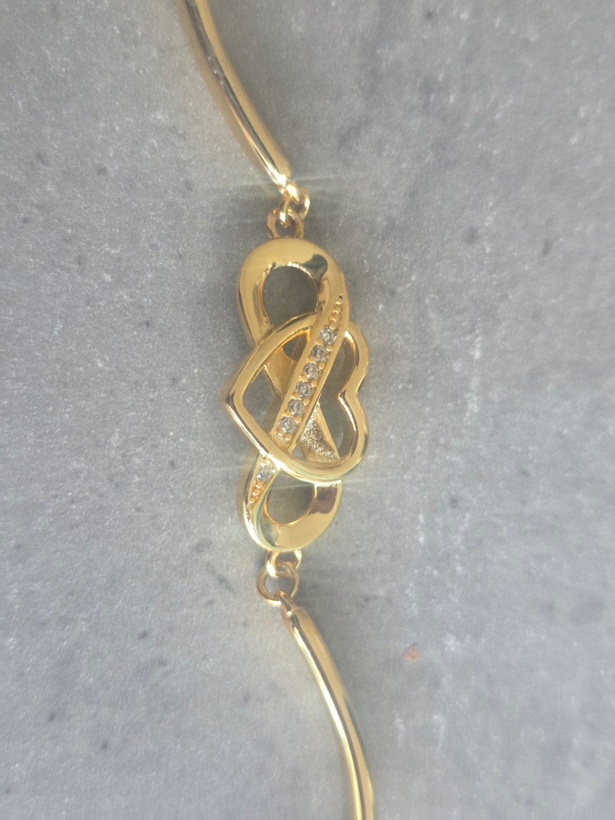 Gouden Armband met Oneindigheidsteken en Strass, Overige materialen, Ophalen of Verzenden, Zo goed als nieuw, Goud