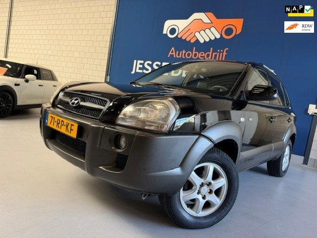 Hyundai Tucson 2.7i V6 4WD Style Automaat / bj.2005 / leder, Auto's, Automaat, Gebruikt, 2656 cc, Zwart