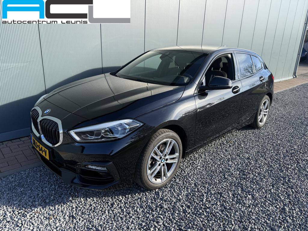 BMW 1-serie 118i 140pk Automaat High Executive Sportline 5-d, Gebruikt, Leder en Stof, Zwart, Bedrijf
