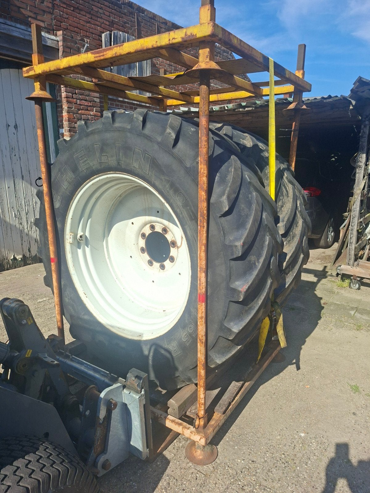 Michelin banden 600 65 38 met velgen, Ophalen