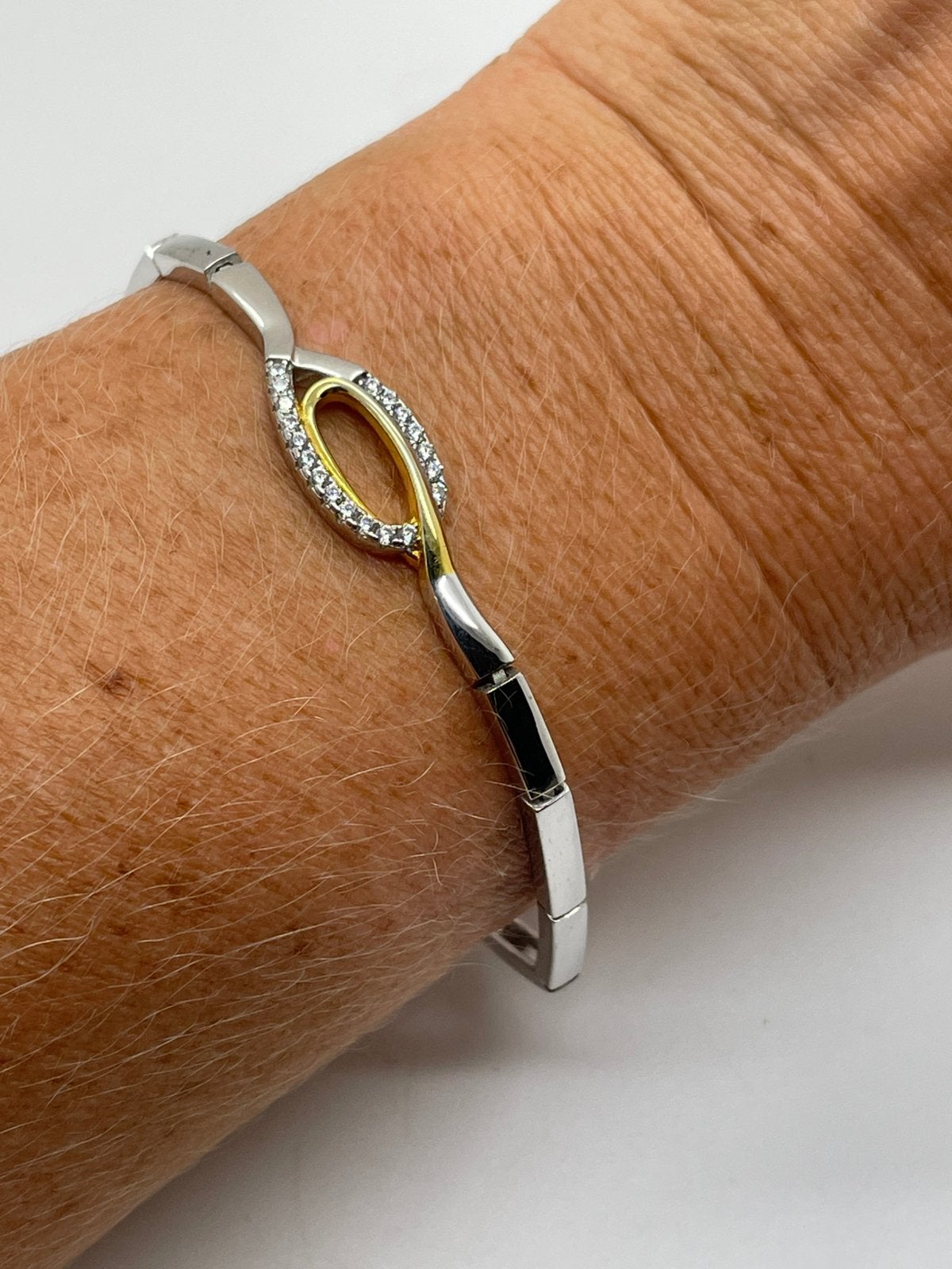 F245 Prachtige zilveren bicolor armband, Ophalen of Verzenden, X, Goud, X