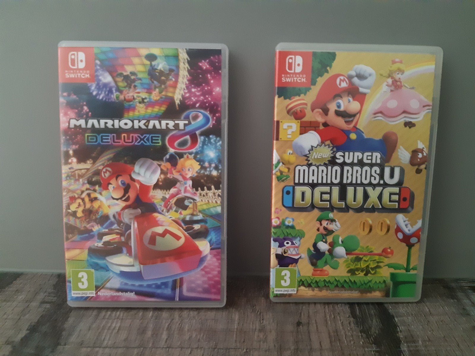 Mario Kart 8 Deluxe & New Super Mario Bros. U Deluxe, Spelcomputers en Games, Games | Nintendo Switch, Zo goed als nieuw, Racen en Vliegen