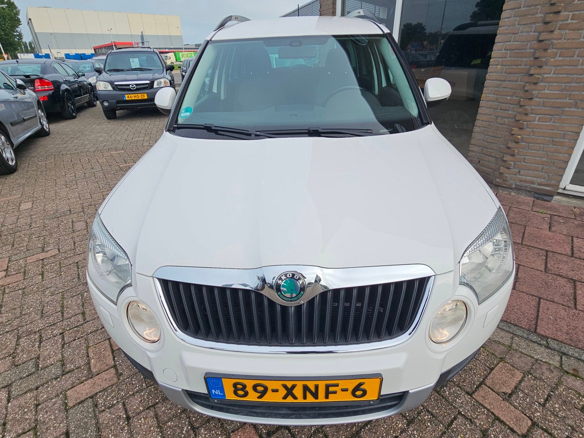 Skoda Yeti 1.2 TSI Ambition Arctic - Navi - Cruise - Electr, Voorwielaandrijving, Euro 5, Stof, Gebruikt