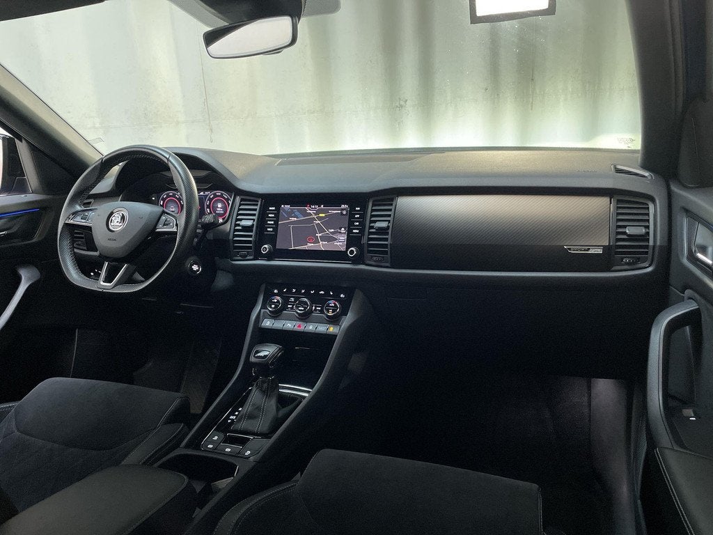 Skoda Kodiaq 1.5 TSI 150pk DSG Sportline Business Sportstoel, Auto's, Skoda, Automatische klimaatregeling, 4 cilinders, Blauw