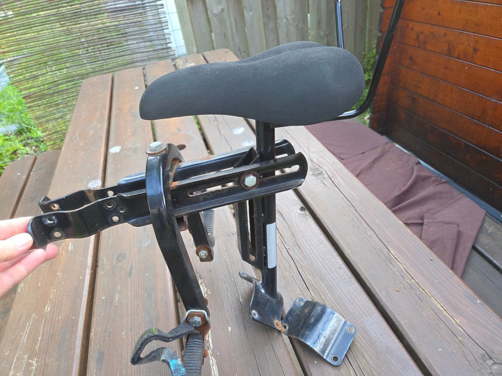 Fietsstoeltje zadel op stang, Ophalen