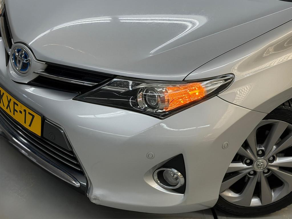 Toyota Auris Touring Sports 1.8 Hybrid Executive Stoelverwar, Auto's, Euro 5, Gebruikt, Leder en Stof, Origineel Nederlands