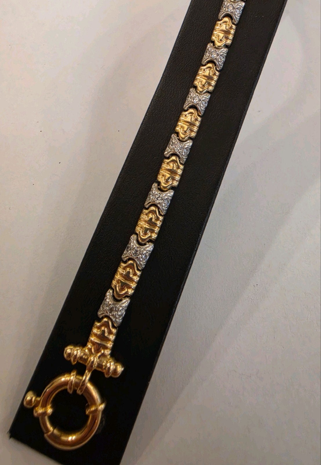 14 karaats gouden bicolor Bulgari schakel armband 19 cm, Met kristal, Ophalen of Verzenden, Zo goed als nieuw, Goud