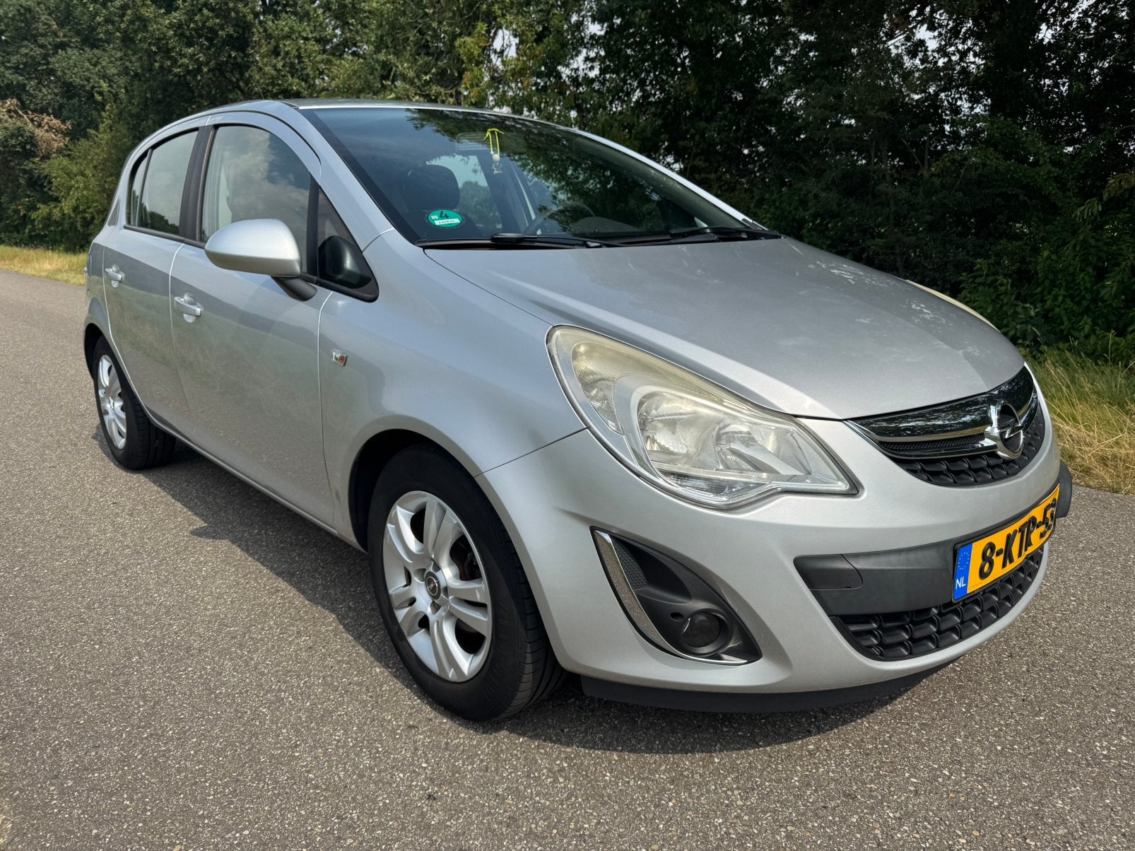 Opel Corsa 1.2 16V 5D 2012 Grijs, Auto's, Opel, Voorwielaandrijving, Euro 5, Zwart, 4 cilinders