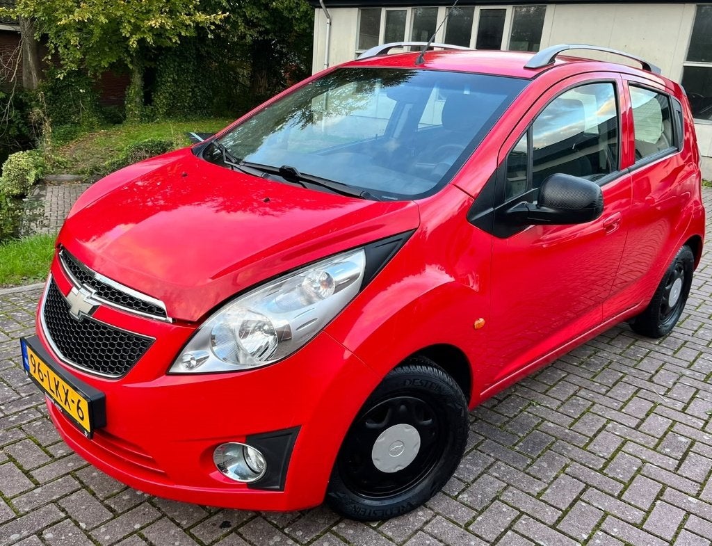 Chevrolet Spark 1.0 16V LT 2010 Rood, Auto's, Voorwielaandrijving, 839 kg, Stof, 68 pk