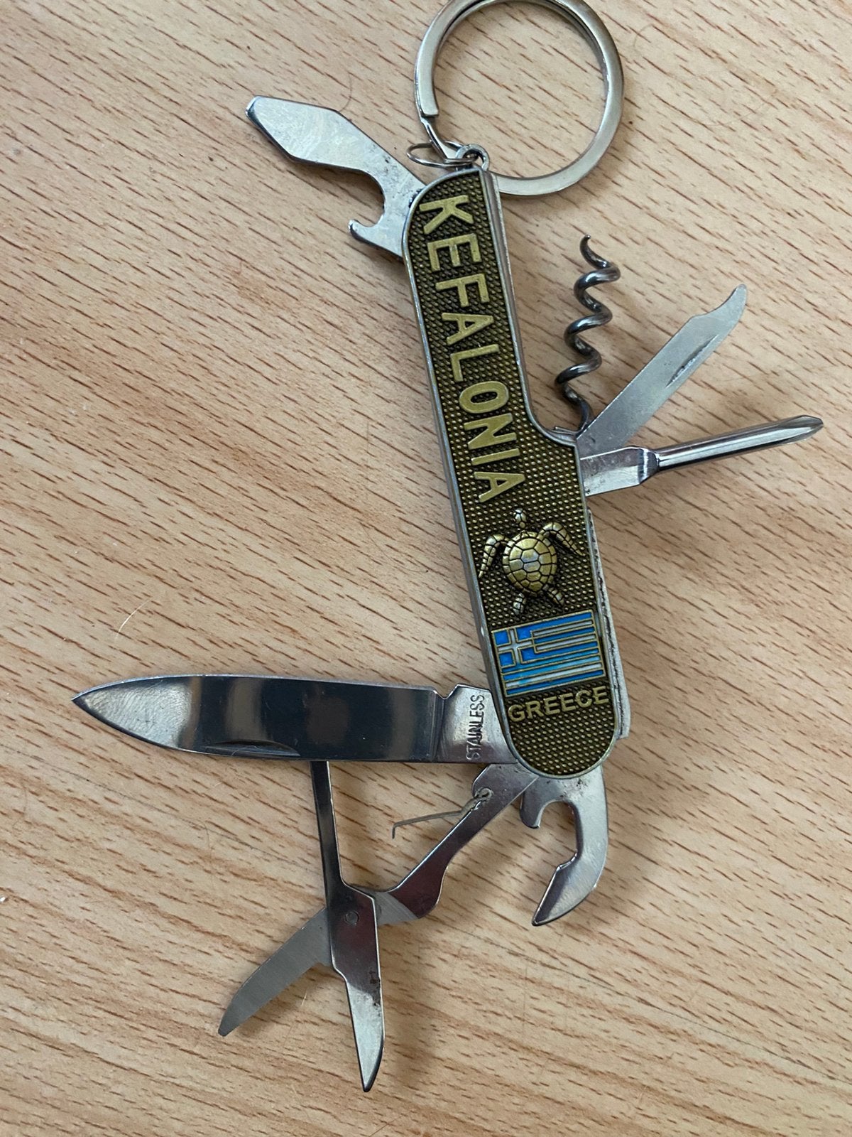 RVS zakmes met Griekse logo, Ophalen of Verzenden, Gebruikt