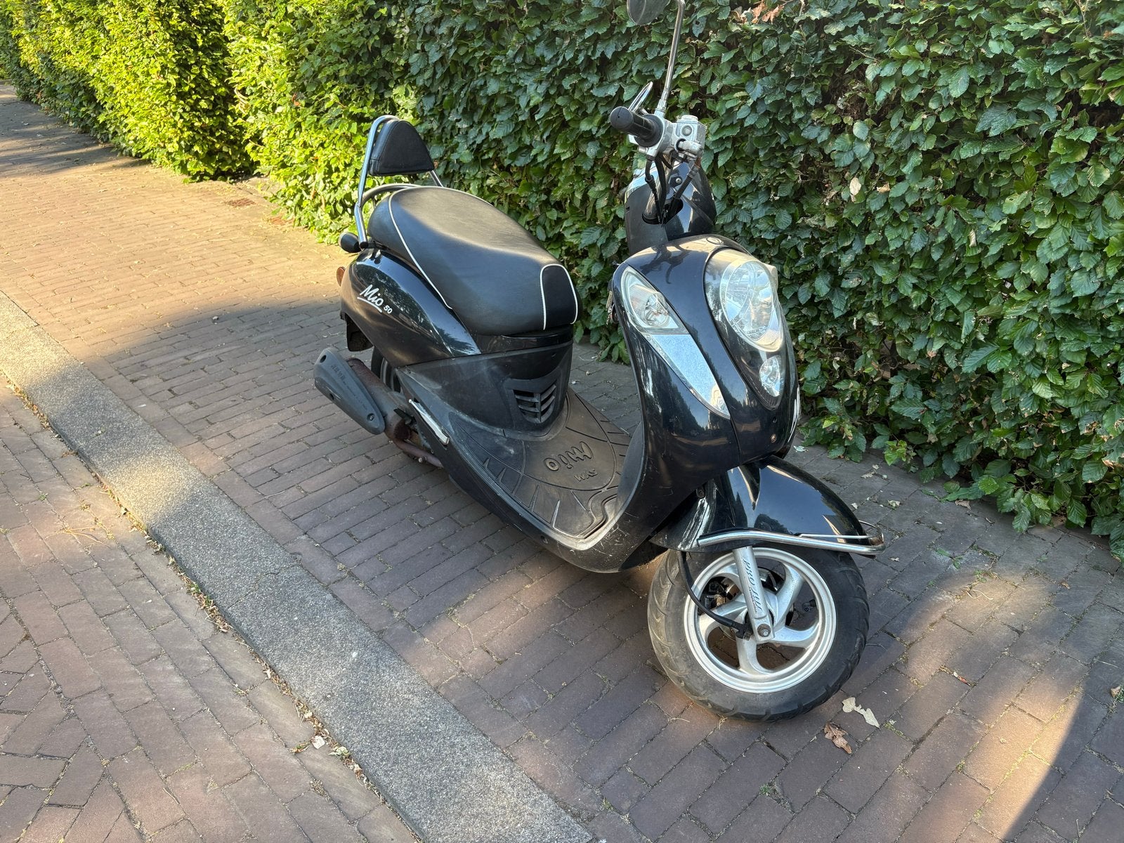 SYM Mio 50 Scooter - Zwart. Loopt goed., Fietsen en Brommers, Scooters | SYM, Gebruikt, Maximaal 45 km/u, 49 cc, Benzine