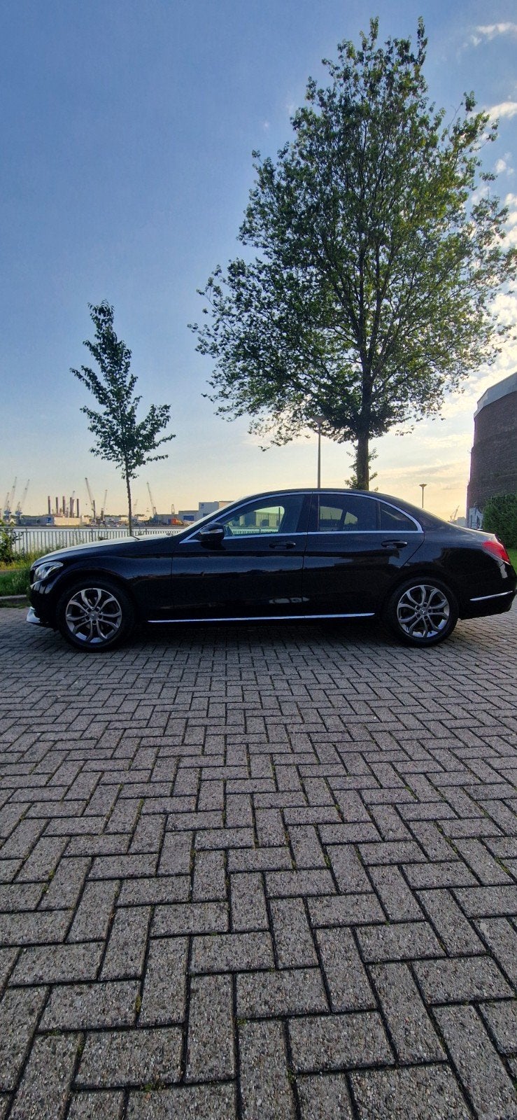 Mercedes-Benz C-Klasse C180 1.6 115KW 2014 Zwart, Auto's, Mercedes-Benz, Achterwielaandrijving, 1295 kg, Zwart, Handgeschakeld