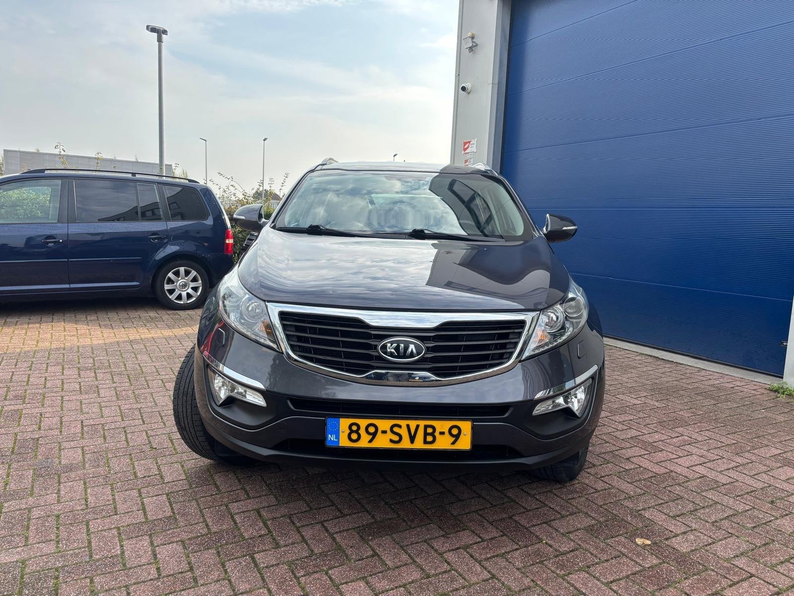 Kia Sportage 2.0 X-clusive INCL NWE APK!, Auto's, Gebruikt, Zwart, 4 cilinders, 163 pk