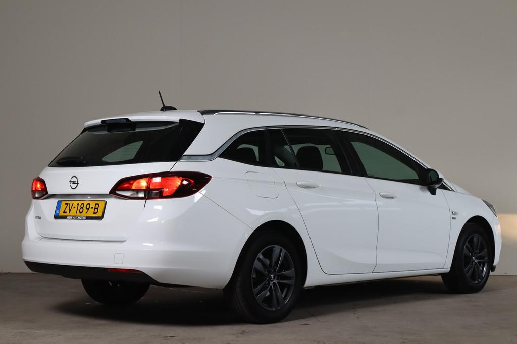 Opel Astra Sports Tourer 1.0 Turbo 120 Jaar Edition NL-Auto!, Stof, Gebruikt, Euro 6, 1178 kg