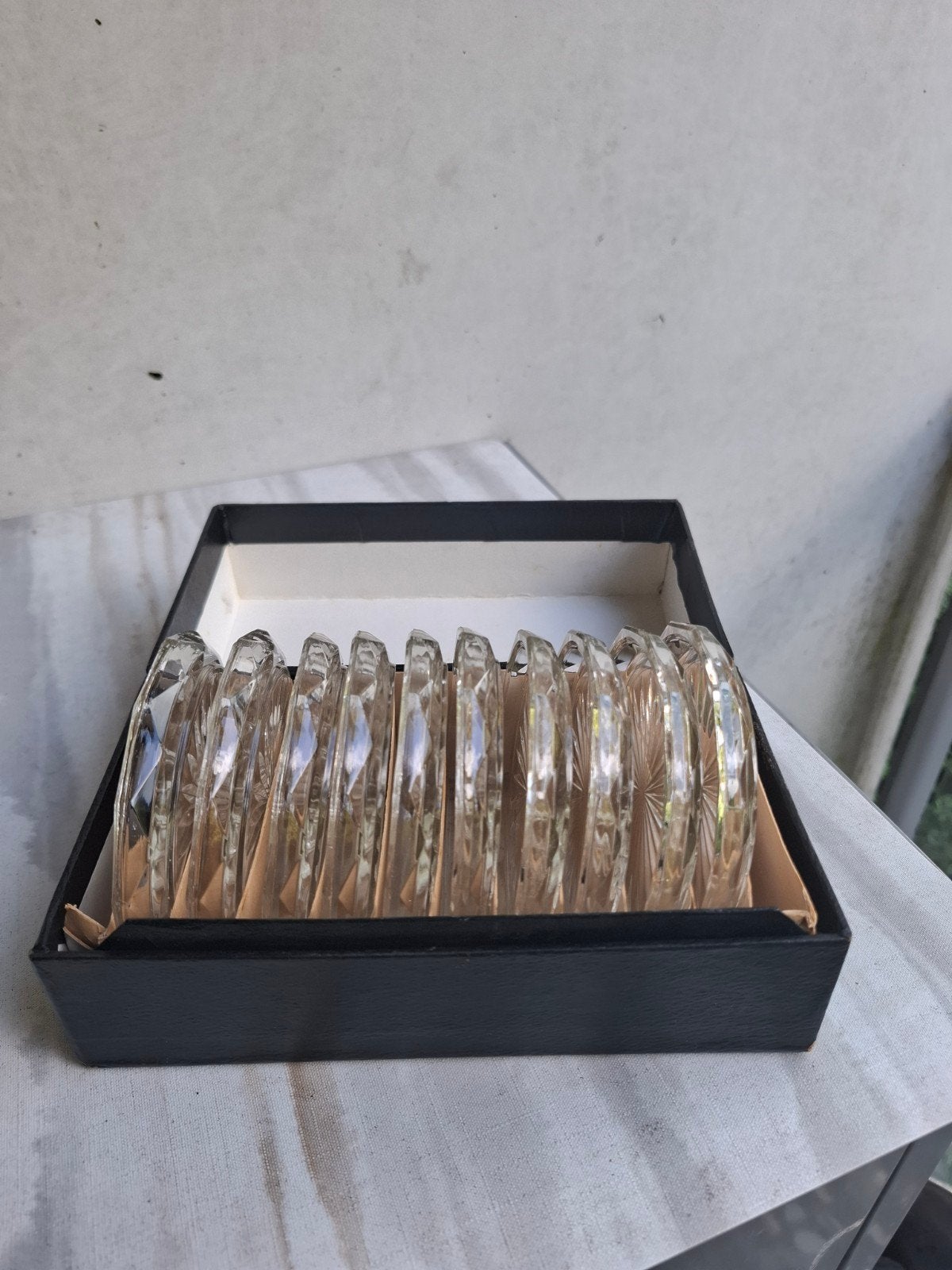 Set van 10 vintage glazen onderzetters in doos, Antiek en Kunst, Curiosa en Brocante, Ophalen of Verzenden
