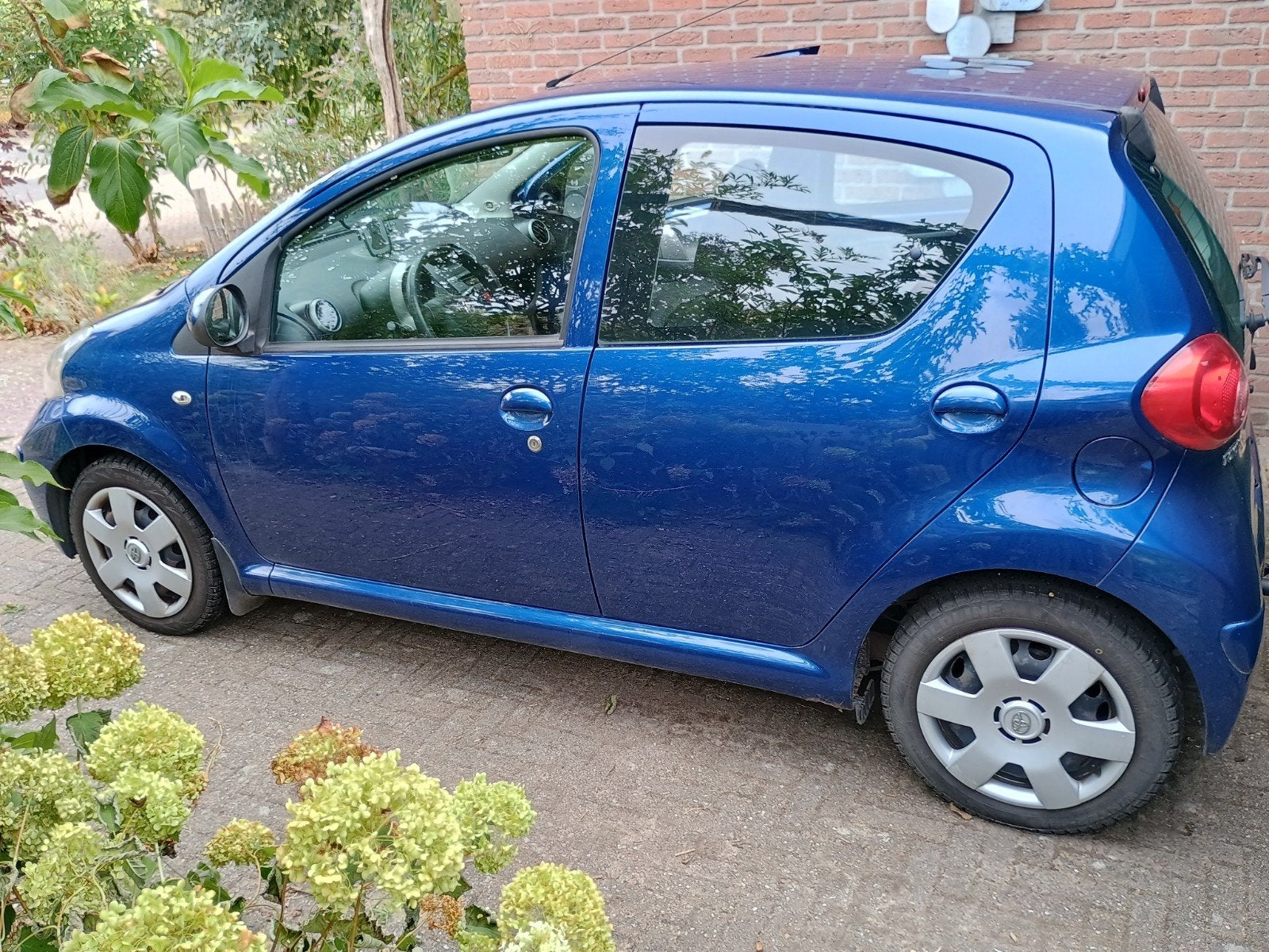 Toyota Aygo 1.0 12V Vvt-i 5DRS weinig km 2007 Blauw, Voorwielaandrijving, 68 pk, Origineel Nederlands, Handgeschakeld