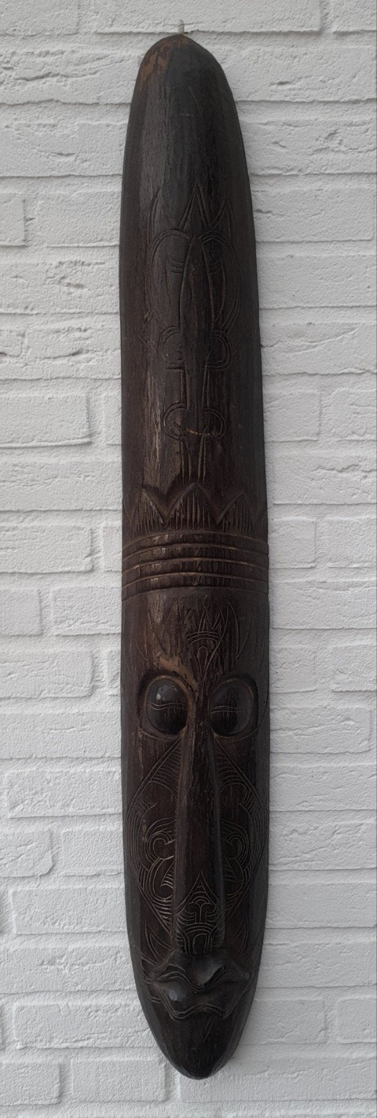 Afrikaans hout masker, Ophalen