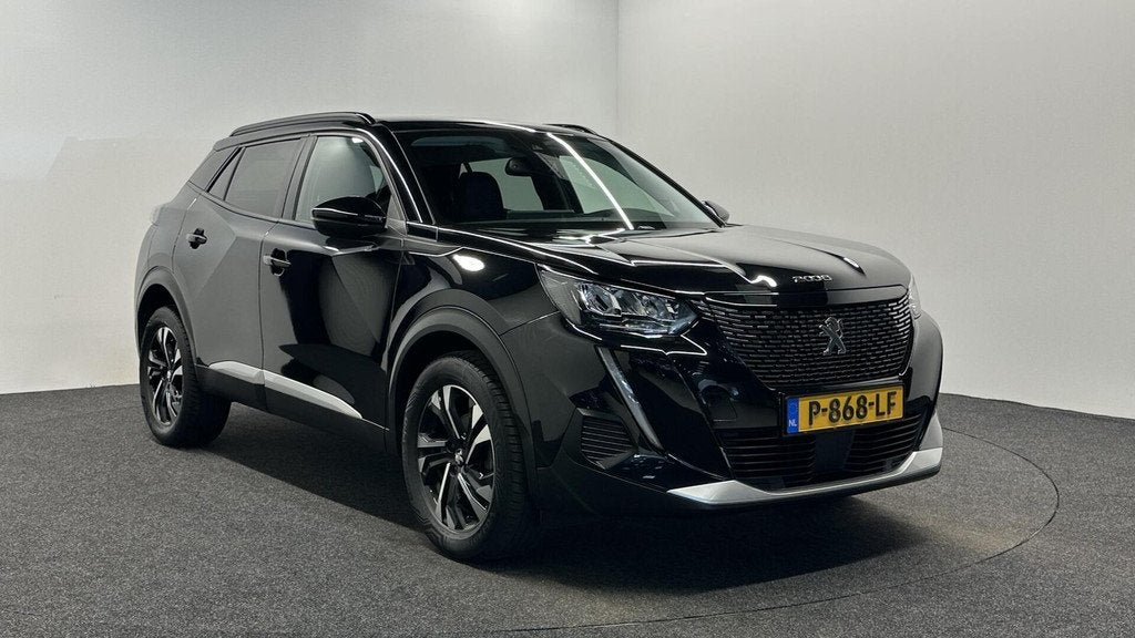 Peugeot 2008 1.2 PureTech Allure Pack CAMERA ECC CRUISE LM N, 101 pk, Gebruikt, 1199 cc, Met garantie (alle)