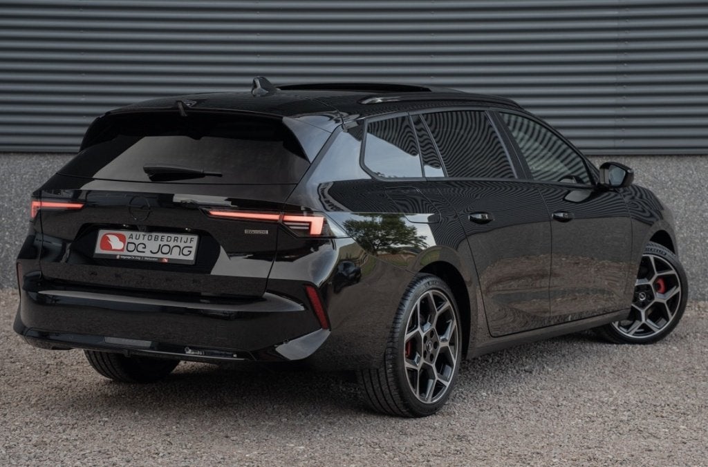 Opel Astra Sports Tourer 1.6 T PHEV Ultimate 180PK | Pano |, Auto's, Opel, 77 km/l, Gebruikt, Zwart, Plug-in hybride