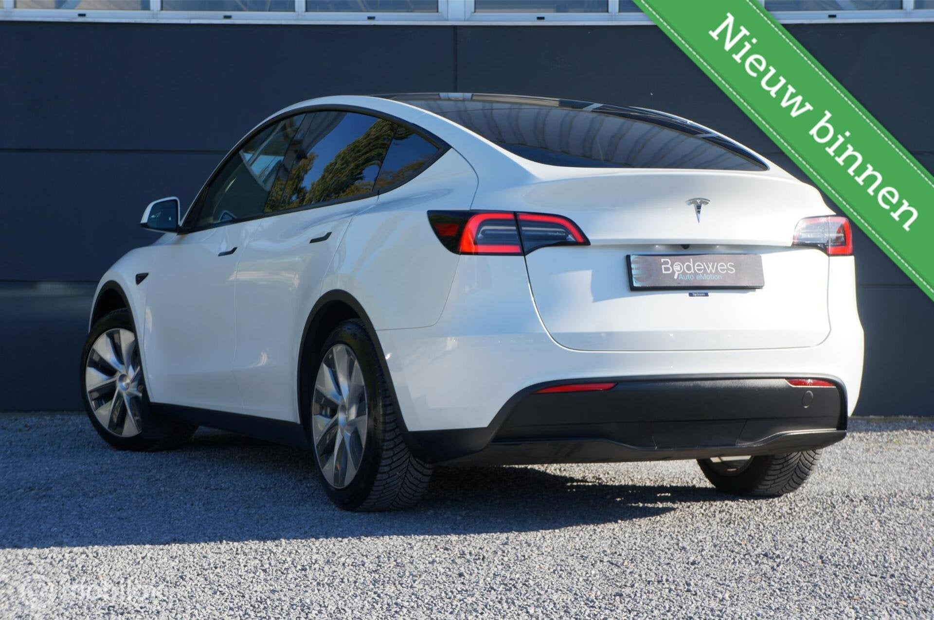 Foto 2 van Tesla Model Y RWD 58 kWh Premium Leather FSD Pano Trekhaak !