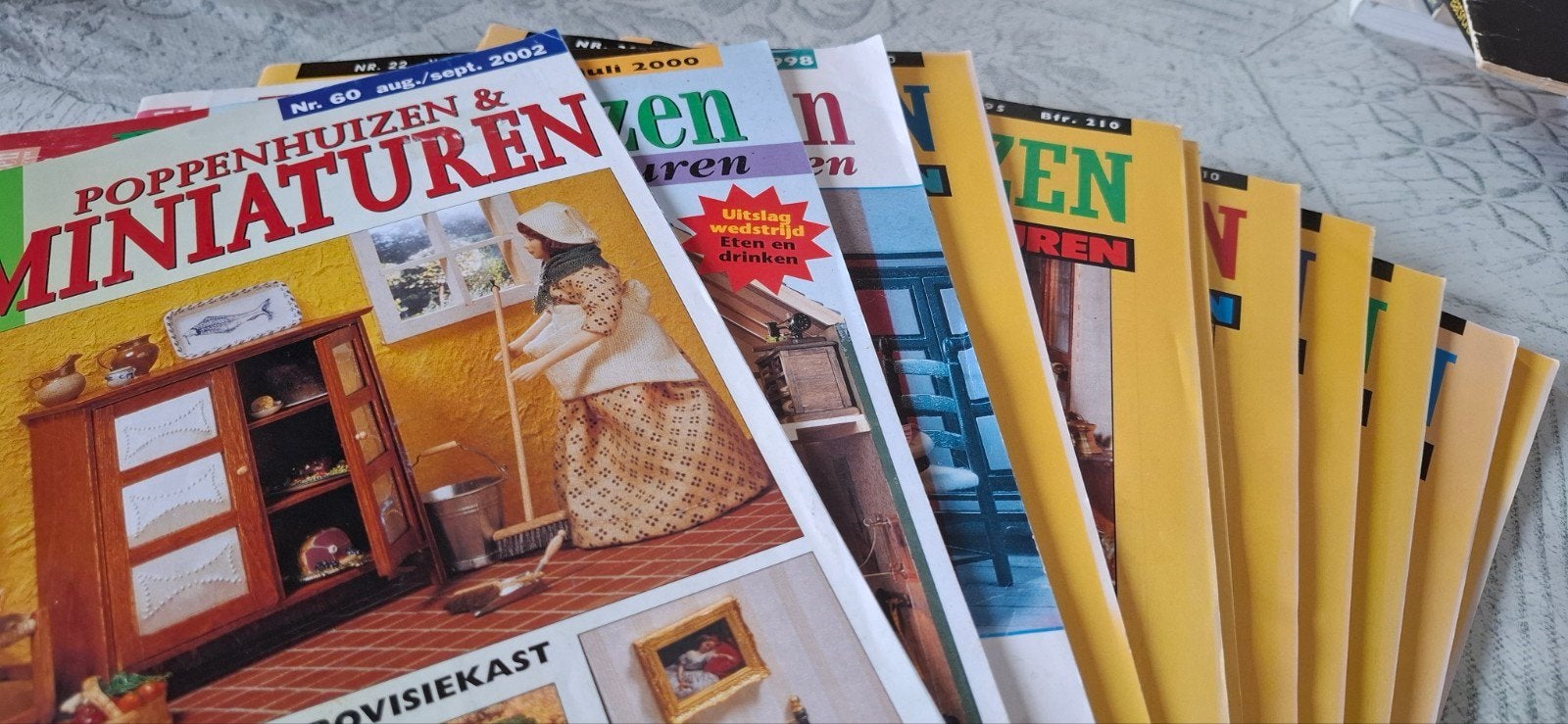 Blad Poppenhuizen & Miniaturen 11 verschillende, Verzamelen, Poppenhuizen en Toebehoren, Ophalen of Verzenden