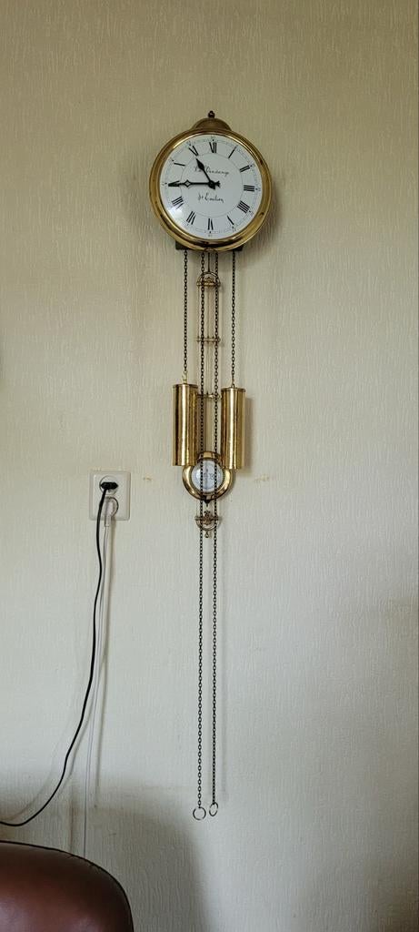 Goudkleurige klok., Ophalen of Verzenden, Wandklok