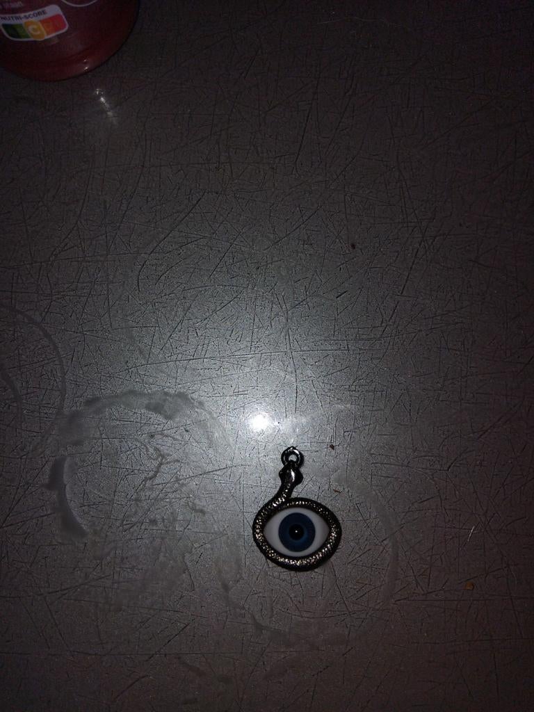 Bedel met boze oog en slang - Zilverkleurig, Overige merken, Overige materialen, Gebruikt, Ophalen of Verzenden