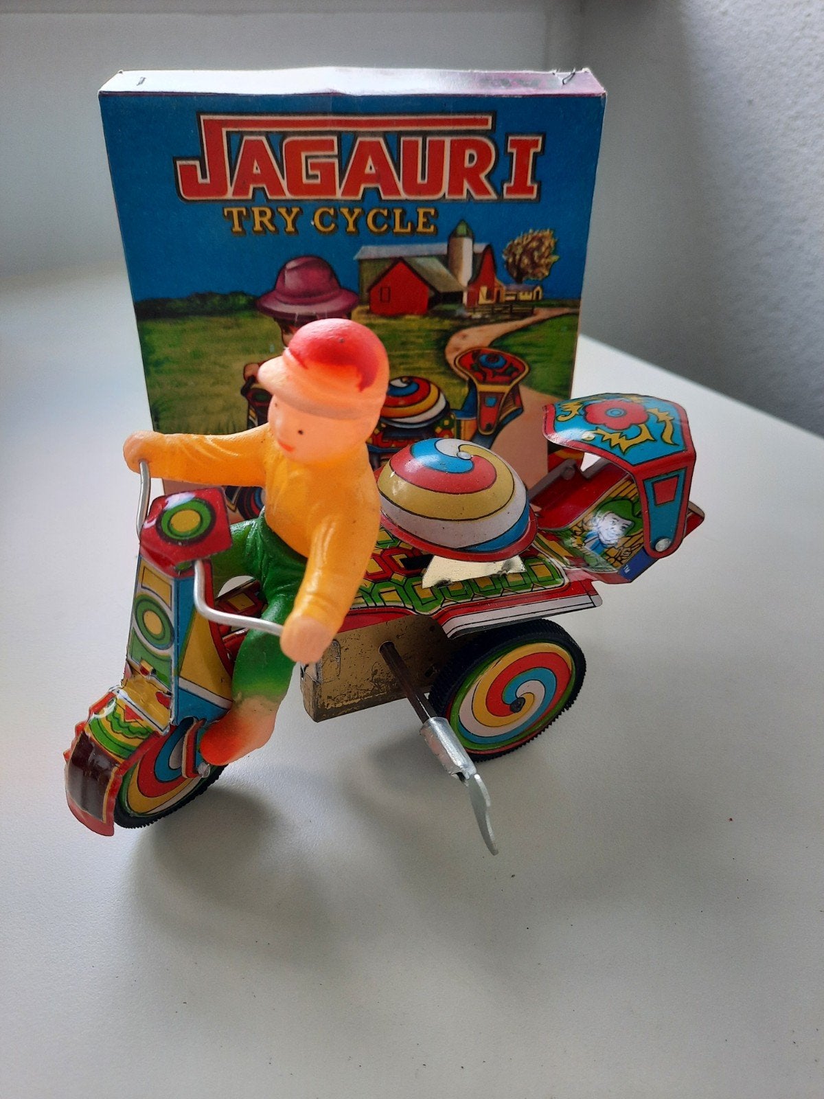 Vintage JAGAURI blikken speelgoed opwindbare fiets, Ophalen of Verzenden