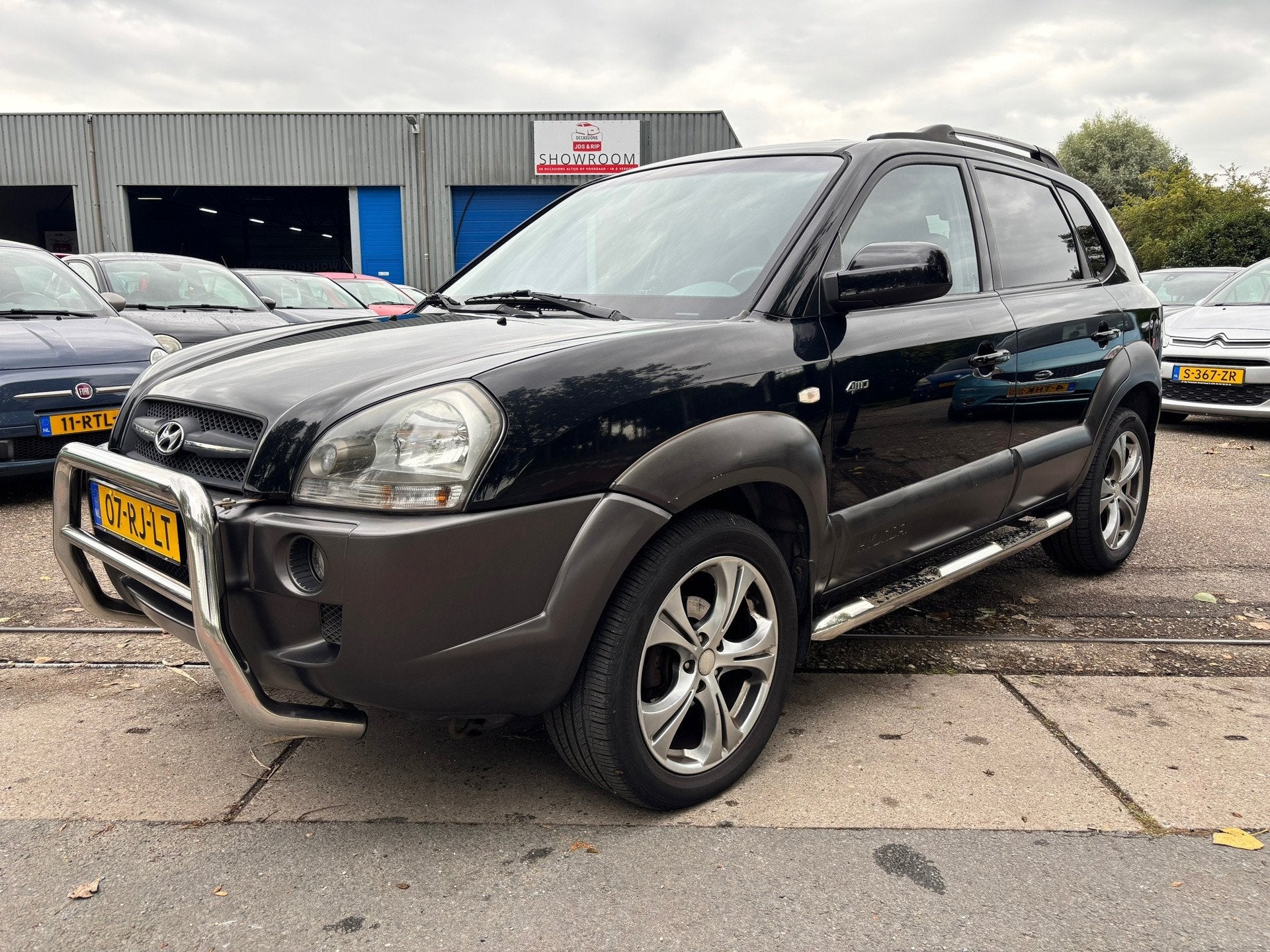 Hyundai Tucson 2.7i V6 4WD Style, Auto's, Automaat, Gebruikt, Zwart, 2656 cc