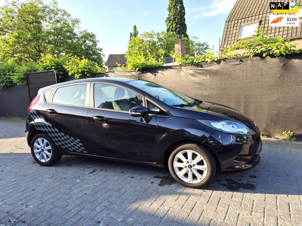 Ford Fiesta 1.25 Limited 5 Deurs Airco Trekhaak, Auto's, Ford, Voorwielaandrijving, Euro 5, Stof, 1242 cc