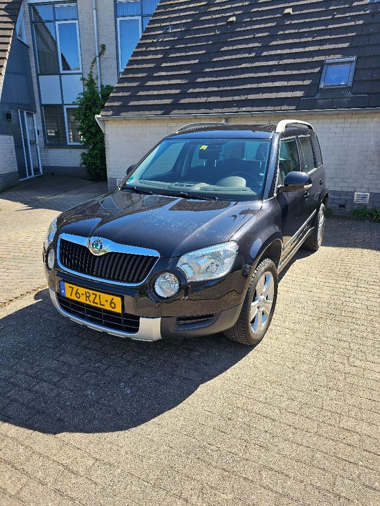 Skoda Yeti 1.2TSI 77KW H6 2011 Zwart, Euro 5, Stof, Zwart, 4 cilinders