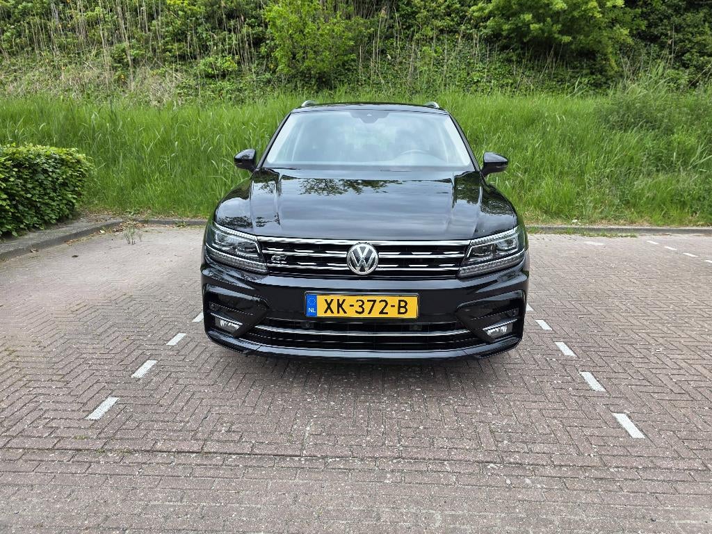 Volkswagen Tiguan Highline Business R-line 1.4 150 pk zwart, Stof, 1800 kg, 4 cilinders, 150 pk