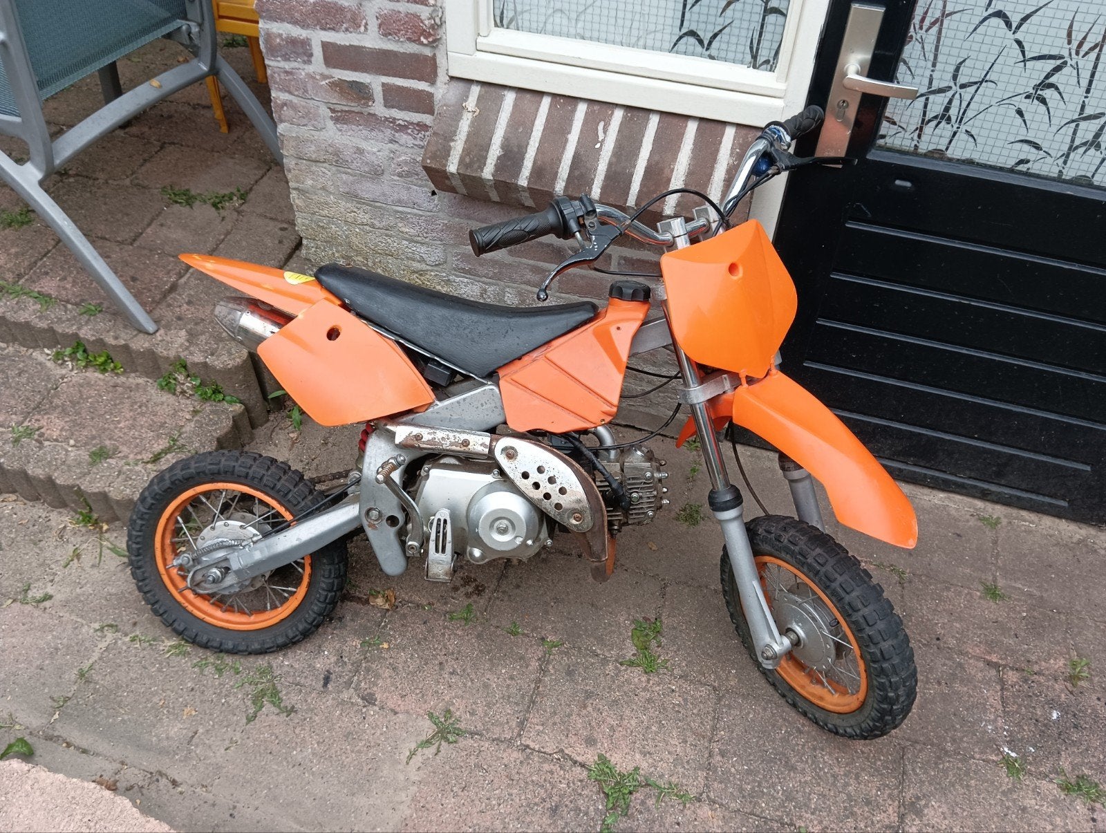 Oranje Pitbike 110cc - Gebruikt maar in goede staat, Fietsen en Brommers, Minibikes, Midibikes en Pitbikes, Gebruikt, Onbekend