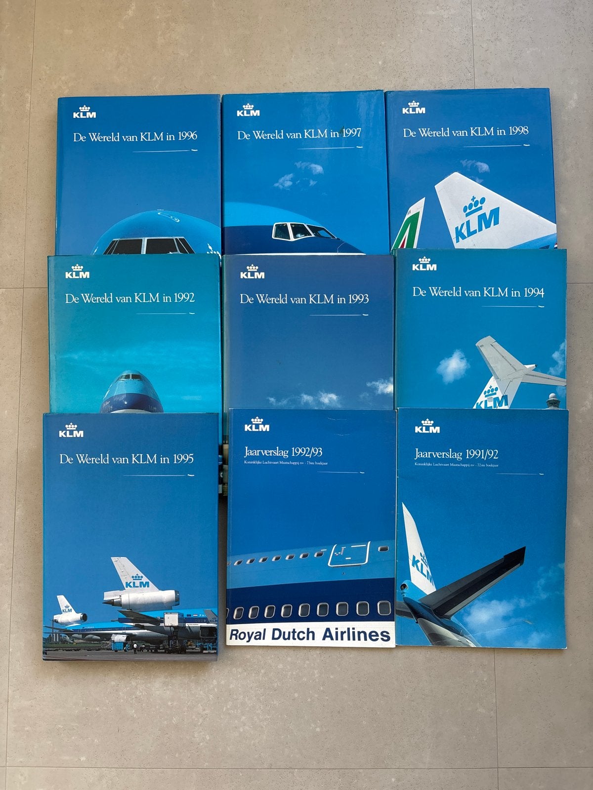 KLM Boeken: De Wereld van KLM & Jaarverslagen (1991-1998), Ophalen of Verzenden, Zo goed als nieuw, Catalogus