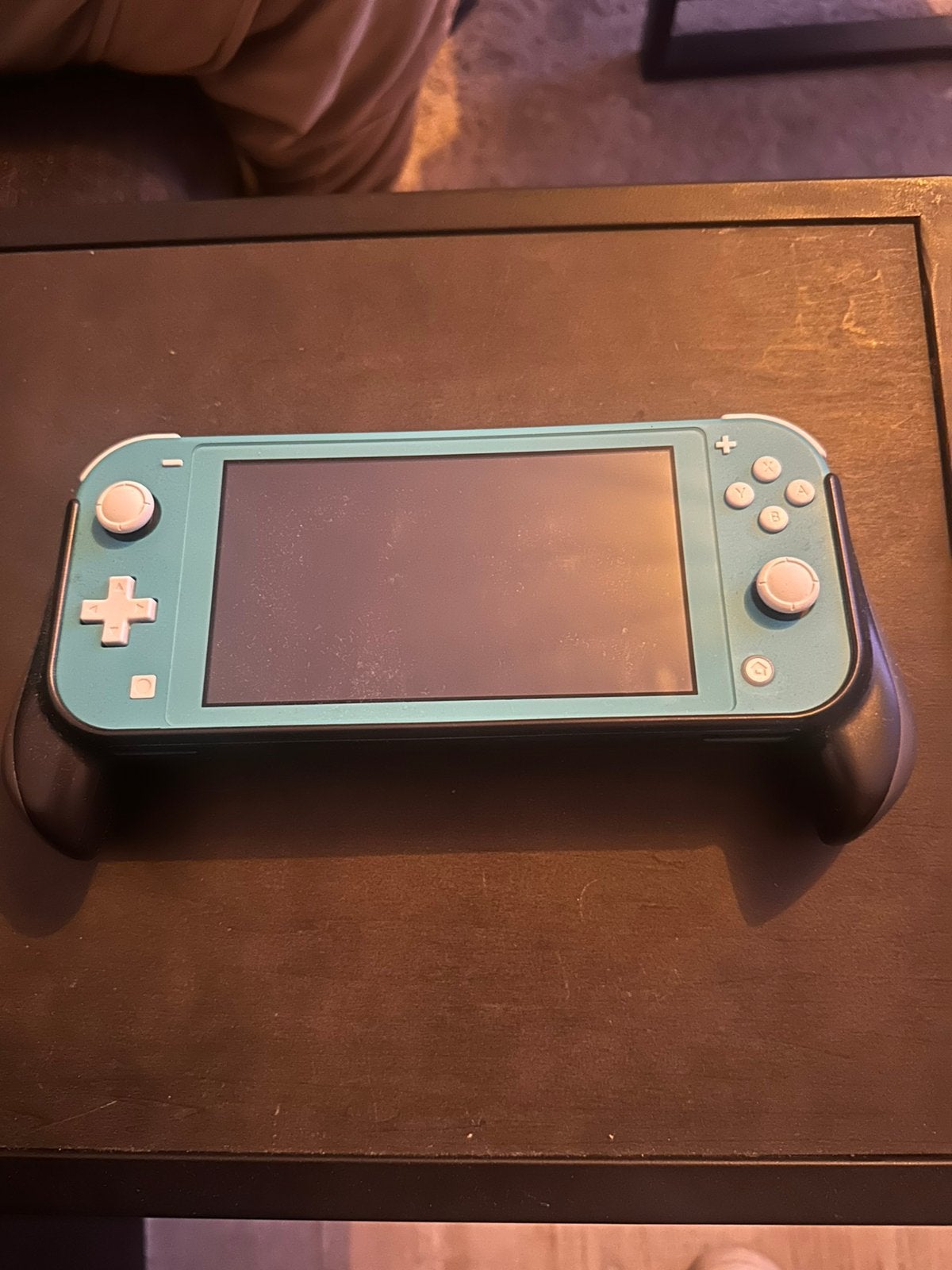Nintendo Switch Lite + grip & hoesje, Spelcomputers en Games, Ophalen of Verzenden, Turquoise, Zo goed als nieuw, Met beschermhoes of tas