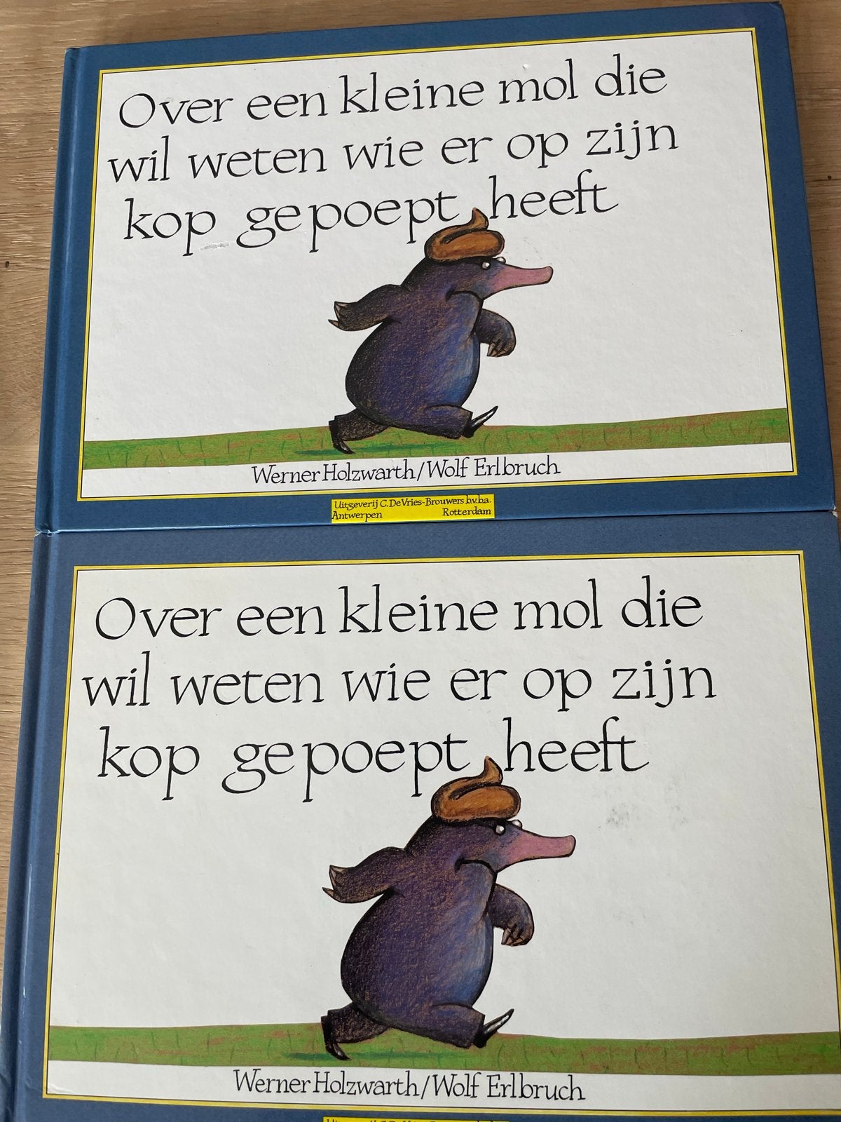 Over een kleine mol die wil weten wie er op zijn kop gepoept, Verzenden, Zo goed als nieuw, Sprookjes