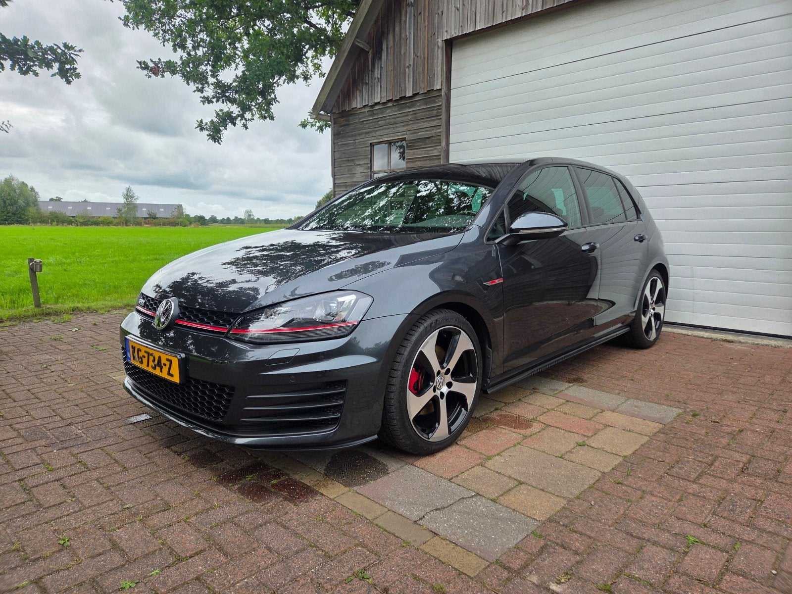 Volkswagen Golf 2.0 TSI 162KW 5D DSG 2015 Zwart, Auto's, Stof, 4 cilinders, 1984 cc, Navigatiesysteem