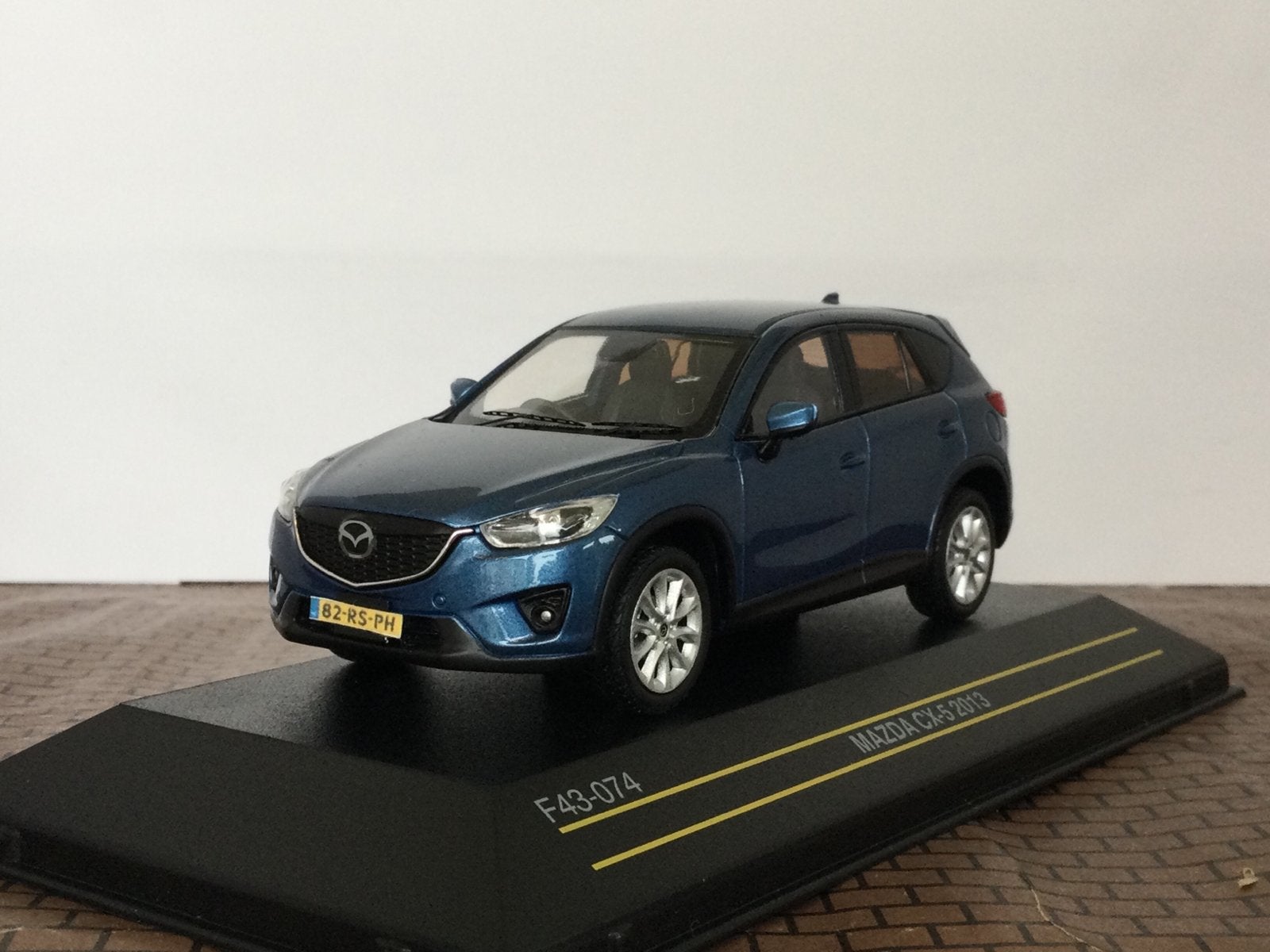 Mazda CX-5 2013 Blauw Metallic First 1:43, Ophalen of Verzenden, Nieuw, Auto, Overige merken