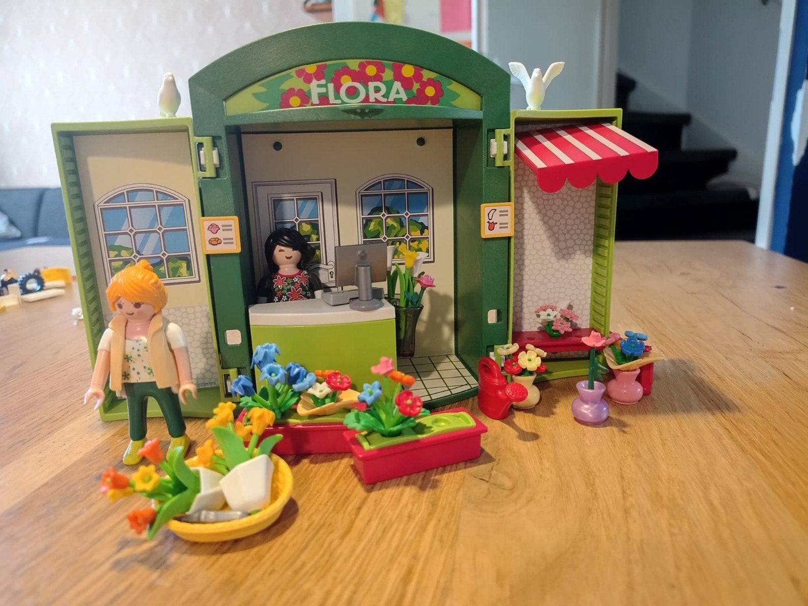 Playmobil bloemenwinkel meeneembox met poppetjes., Gebruikt, Complete set, Overige typen, Ophalen of Verzenden