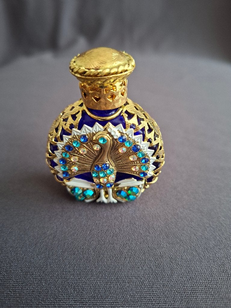 Vintage parfumflesje met paauw, Ophalen of Verzenden, Zo goed als nieuw, Parfumfles