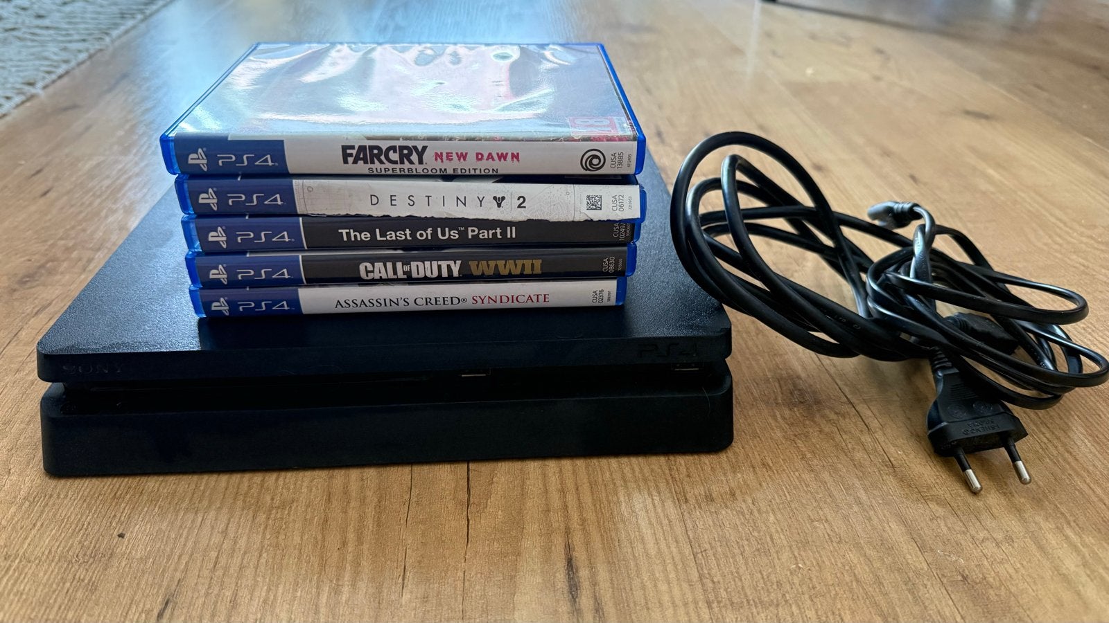 PlayStation 4 Slim 500GB met 5 games en kabels, Ophalen of Verzenden, Zo goed als nieuw, Zonder controller, Slim